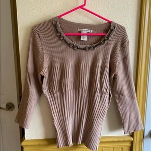 Beautifully embellished tan sweater.